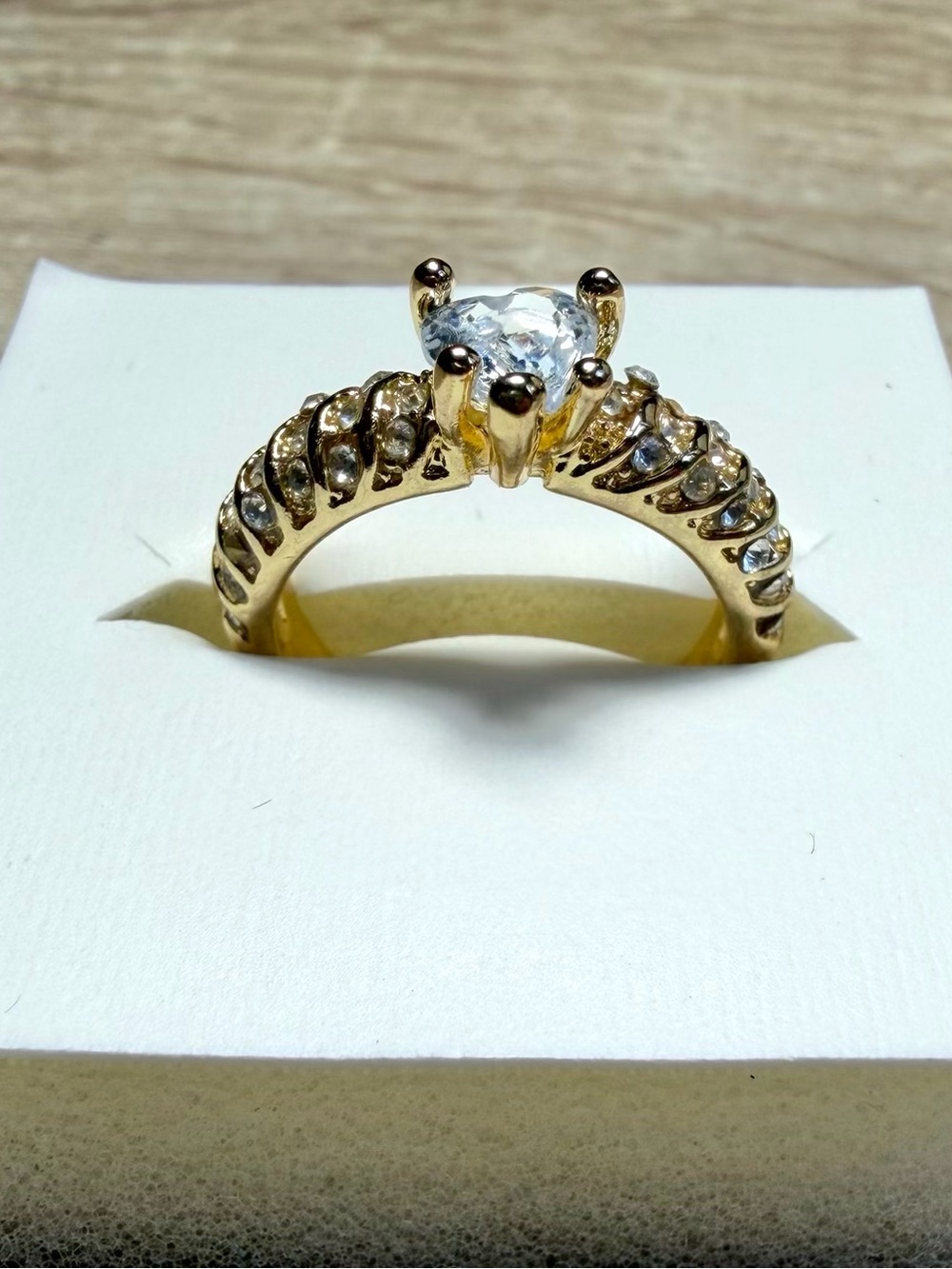 Gold Solitaire Engagement Ring with Clear Center Stone